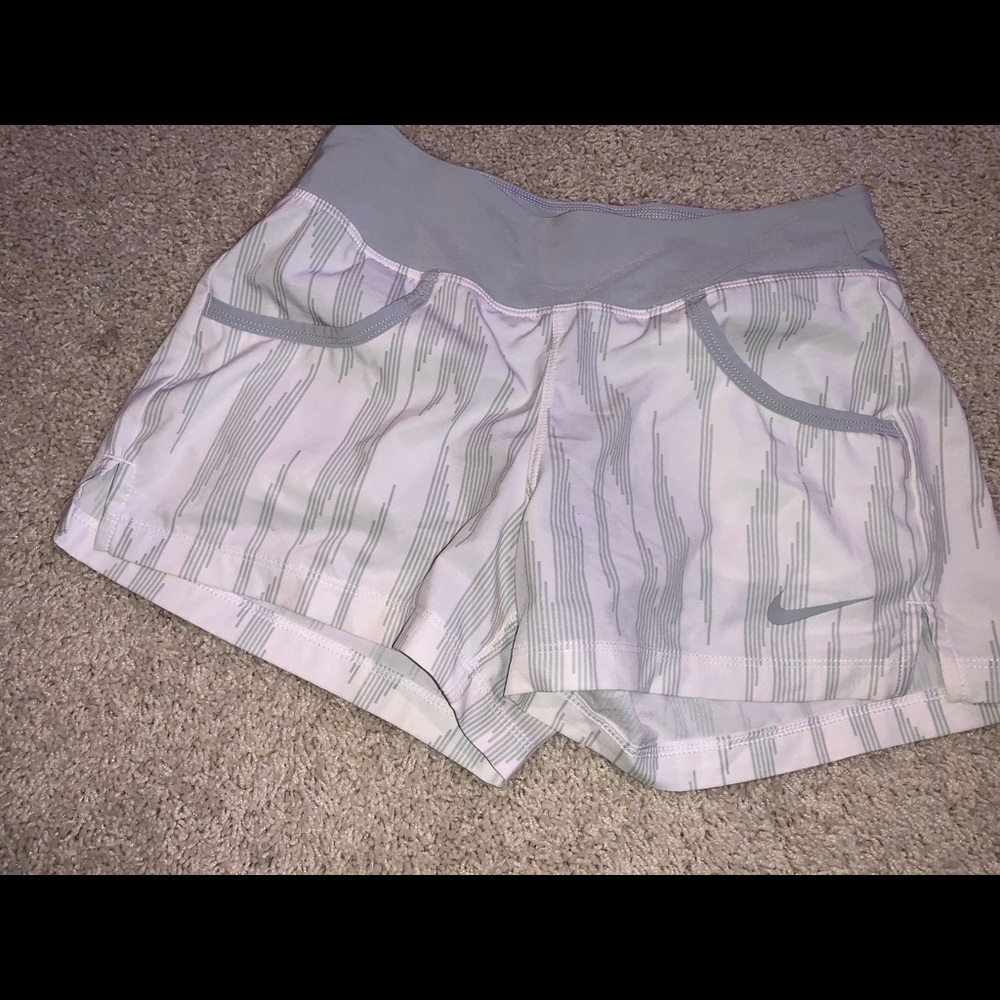 grey and white nike shorts